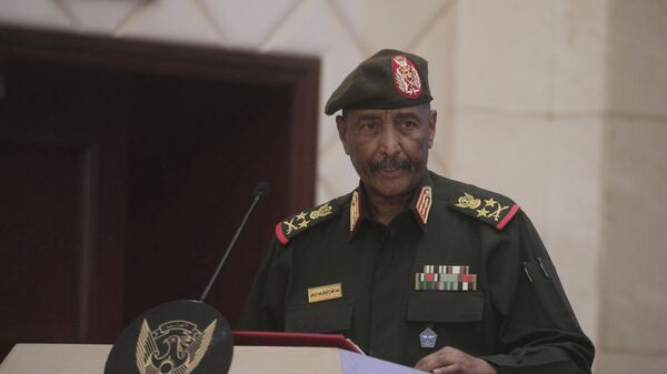 Sudan's Army chief Gen. Abdel-Fattah Burhan speaks following the signature of an initial deal aimed at ending a deep crisis caused by last year's military coup, in Khartoum, Sudan, Dec. 5, 2022 - Sputnik Türkiye