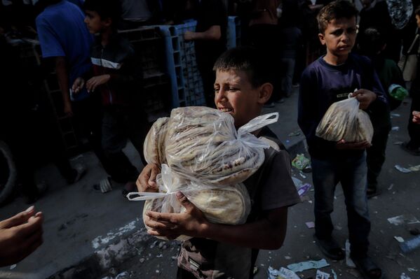 Ateşkesin sağlanmasının ardından Gazze Şeridi’ndeki bazı ekmek fırınları yeniden faaliyet göstermeye başladı.  - Sputnik Türkiye