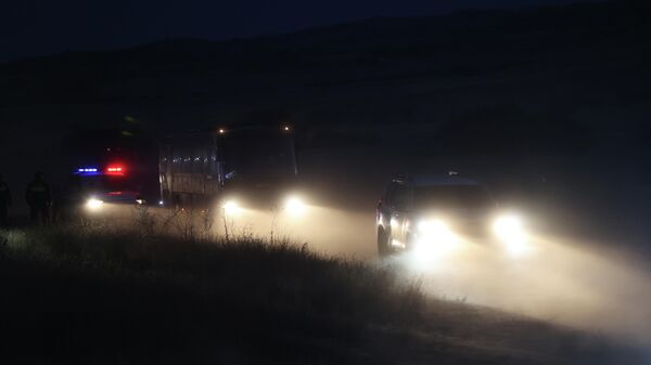 Gürcistan'ın Kakheti bölgesinde dün düşen C130 tipi askeri kargo uçağının enkaz alanındaki arama kurtarma çalışmaları gece saatlerinde de devam etti - Sputnik Türkiye