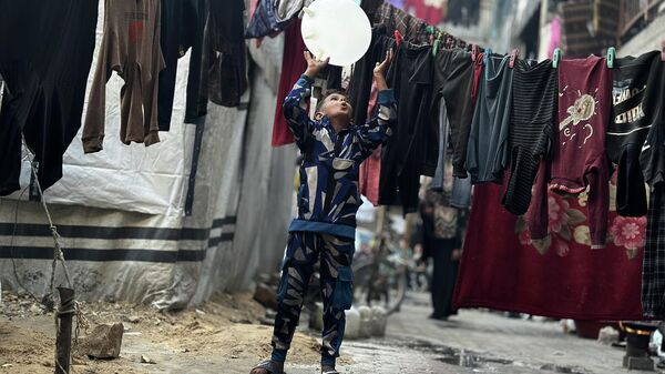Dünya Çocuk Günü’nde Gazze'deki çocukların zorlu yaşam mücadelesi - Sputnik Türkiye