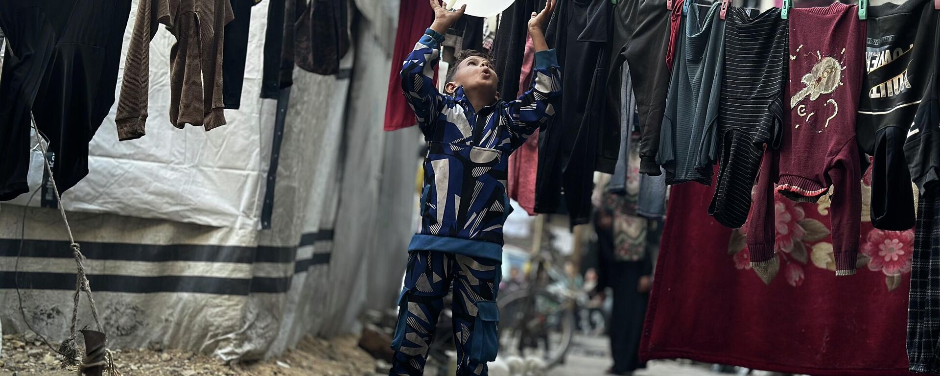 Dünya Çocuk Günü’nde Gazze'deki çocukların zorlu yaşam mücadelesi - Sputnik Türkiye, 1920, 11.02.2026