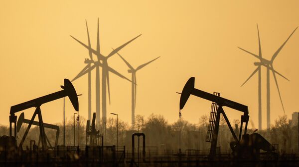 Pumpjacks of Wintershall DEA extracting crude oil at an old oil field in Emlichheim, Germany, Friday, March 18, 2022. - Sputnik Türkiye