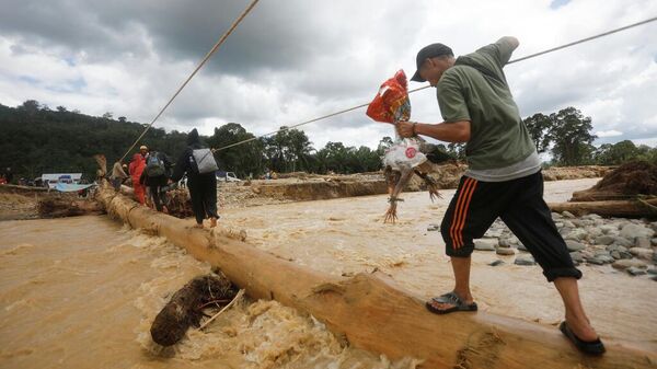 Asya ülkelerinde sel felaketinde ölenlerin sayısı bini aştı - Sputnik Türkiye