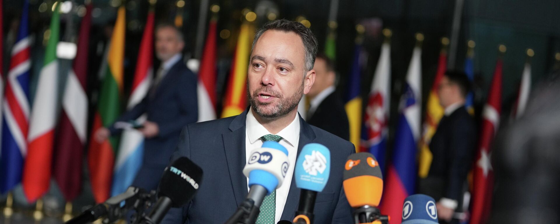 Belgium's Foreign Minister Maxime Prevot speaks with the media as he arrives for a meeting of NATO foreign ministers at NATO headquarters in Brussels - Sputnik Türkiye, 1920, 03.12.2025