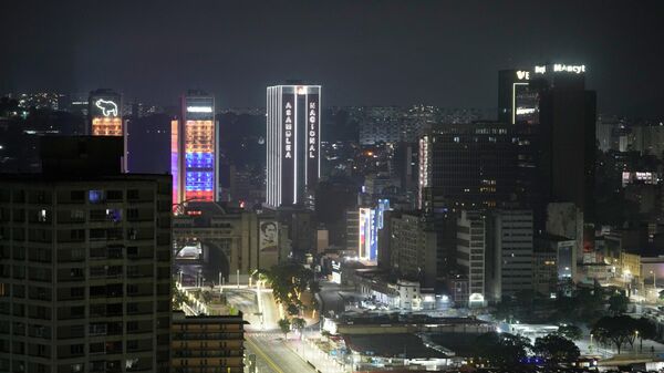 National Assembly building is lightened in downtown Caracas, Venezuela, after explosions and low-flying aircraft were heard, Saturday, Jan. 3, 2026.  - Sputnik Türkiye