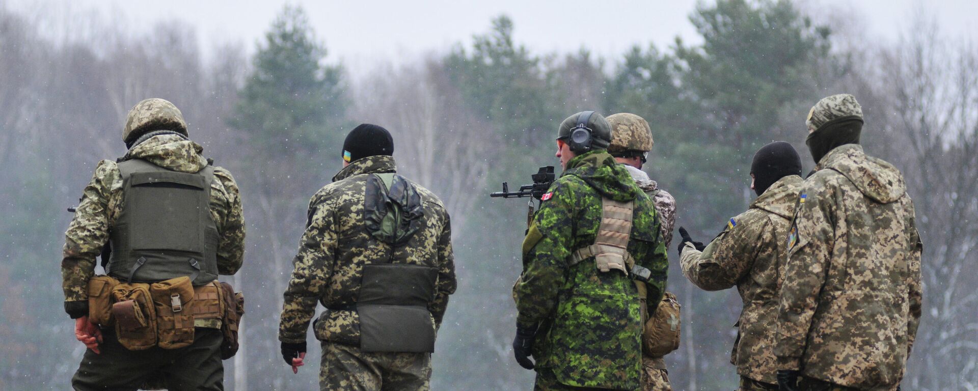 Canadian instructors train Ukrainian service persons as part of UNIFIER operation at Yavorivsky training range in the Lviv Region. - Sputnik Türkiye, 1920, 21.01.2026
