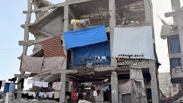 Gazze sakinleri: Yıkılma riski altındaki harabe evlerde yaşamak zorundayız - Sputnik Türkiye