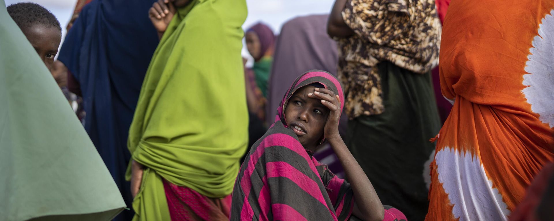 Somali women wait their turn to collect water at a camp for displaced people on the outskirts of Dollow, Somalia on Monday, Sept. 19, 2022.  - Sputnik Türkiye, 1920, 11.08.2026