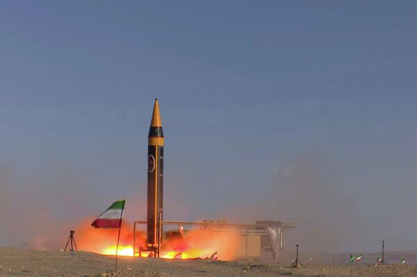 In this photo released by the Iranian Defense Ministry on May 25, 2023, Khorramshahr-4 missile is launched at an undisclosed location, Iran (Iranian Defense Ministry via AP) - Sputnik Türkiye