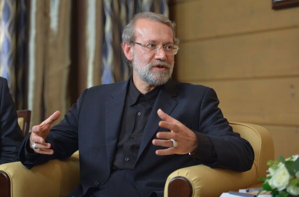 Speaker of the Islamic Consultative Council (parliament) of the Islamic Republic of Iran Ali Larijani during a meeting with Russian President Vladimir Putin following the 12th annual meeting of the Valdai International Discussion Club. File photo - Sputnik Türkiye