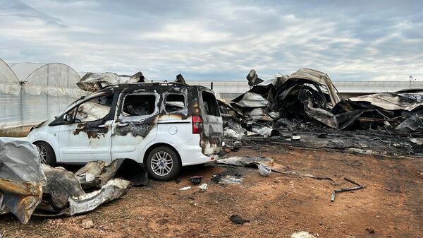 Antalya'nın Kepez ilçesinin Gaziler Mahallesi'nde bir konteynerde çıkan yangında anne ve 5 çocuğu hayatını kaybetti. - Sputnik Türkiye