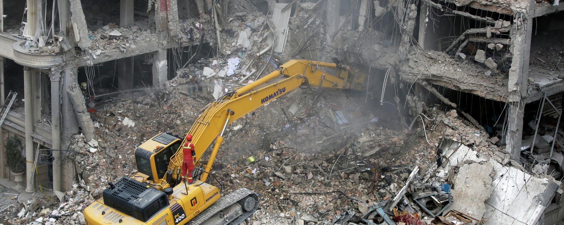 Tahran’daki Enderzgu bölgesinde çok katlı bir apartman enkazı - Sputnik Türkiye, 1920, 25.03.2026