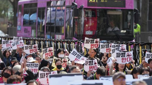 Güney Kore'de protestocular ABD-İsrail saldırılarını kınadı - Sputnik Türkiye