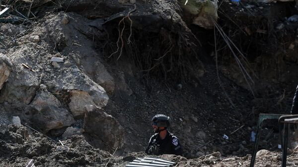 İran'ın İsrail'in merkezine düzenlediği füze saldırılarının ardından oluşan hasar havadan görüntülendi - Sputnik Türkiye