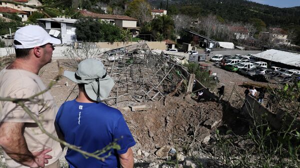 İran'ın İsrail'in merkezine düzenlediği füze saldırılarının ardından oluşan hasar havadan görüntülendi - Sputnik Türkiye