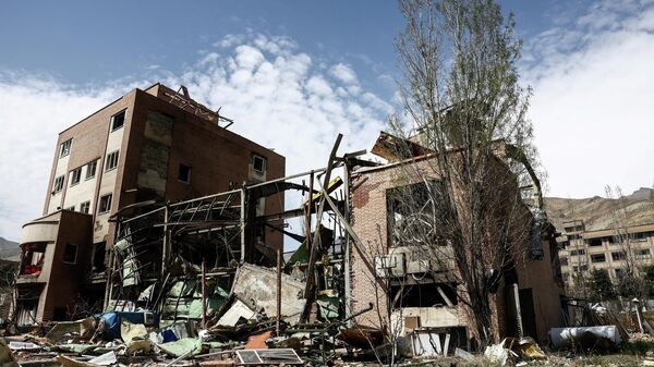 İran'ın başkenti Tahran'da, ABD-İsrail çatışması sırasında yıkılan Shahid Beheshti Üniversitesi görüntülendi - Sputnik Türkiye