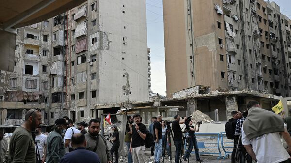 İsrail'in saldırılarıyla yerinden edilen Lübnanlar, geçici ateşkesle evlerine dönmeye başladı - Sputnik Türkiye