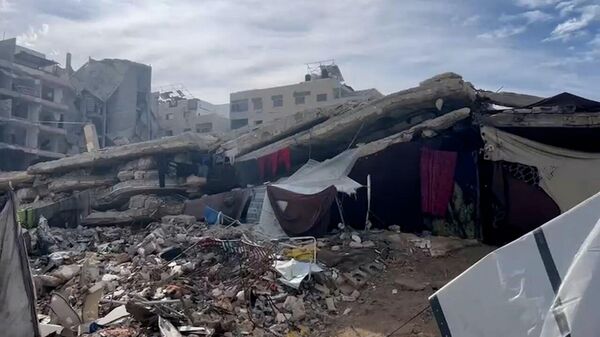 Gazze’de enkaz altındaki cenazeler: aileler yakınlarına ulaşamıyor - Sputnik Türkiye