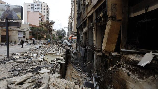 Ateşkes sessizliğindeki savaş yankısı: Beyrut'un güney banliyösü İsrail’in hava saldırılarına maruz kaldı - Sputnik Türkiye