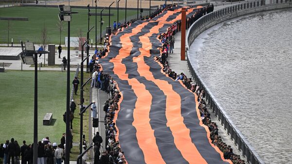 Moskova’da 'Aziz George Kurdelesi' kampanyası düzenlendi - Sputnik Türkiye