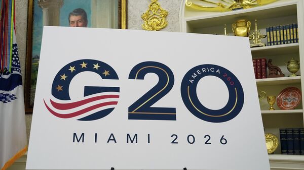 A sign for the G20 to be hosted in Miami in 2026 is displayed as President Donald Trump speaks in the Oval Office of the White House, Friday, Sept. 5, 2025, in Washington. - Sputnik Türkiye