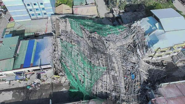 Filipinler'de inşaat çöktü: 1 kişi öldü, 26 kişi göçükten kurtarıldı - Sputnik Türkiye