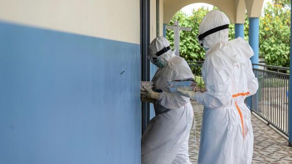 Ebola vakalarındaki artış endişelendirirken DSÖ Direktörü Tedros, bölgeyi ziyaret etti - Sputnik Türkiye