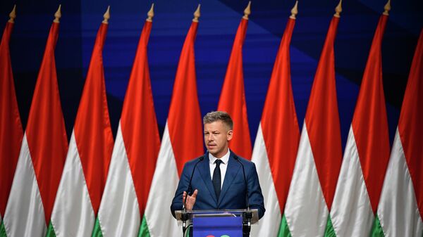 Peter Magyar gestures as he speaks to the media in Budapest, Hungary, Monday, April 13, 2026, after defeating Prime Minister Viktor Orban's party in the country's parliamentary elections. - Sputnik Türkiye