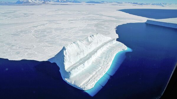 The frigid Antarctic region is an expanse of white ice and blue waters, as pictured in March, 2017, at the U.S. research facility McMurdo Station. - Sputnik Türkiye