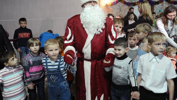 Ukraynalı mültecilerin barındığı Rostov bölgesinde yeni yıl partisi - Sputnik Türkiye
