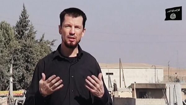 IŞİD'in elindeki İngiliz gazeteci John Cantlie - Sputnik Türkiye
