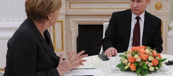 Almanya Başbakanı Angela Merkel ve Rusya lideri Vladimir Putin Almanya Başbakanı Angela Merkel ve Rusya lideri Vladimir Putin - Sputnik Türkiye