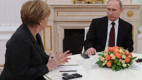 Almanya Başbakanı Angela Merkel ve Rusya lideri Vladimir Putin - Sputnik Türkiye