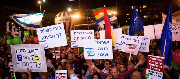 İsrail'de Başbakan Benyamin Netanyahu protestosu İsrail'de Başbakan Benyamin Netanyahu protestosu - Sputnik Türkiye