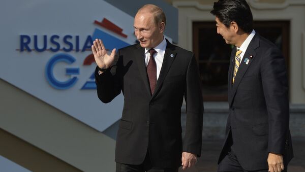 Japonya Başbakanı Şinzo Abe ve Rusya Devlet Başkanı Vladimir Putin - Sputnik Türkiye