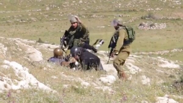 İsrail askerleri bu kez foto muhabirlerine şiddet uyguladı. - Sputnik Türkiye