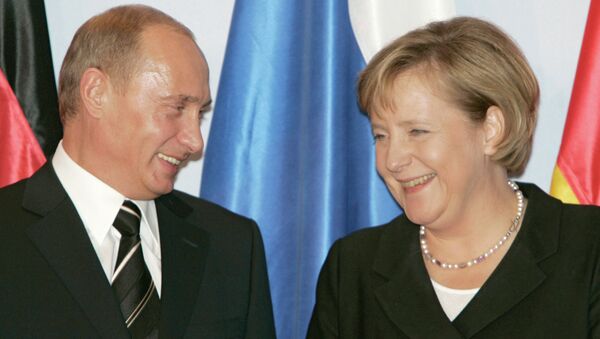 Rusya Devlet Başkanı Vladimir Putin ve Almanya Başbakanı Angela Merkel - Sputnik Türkiye