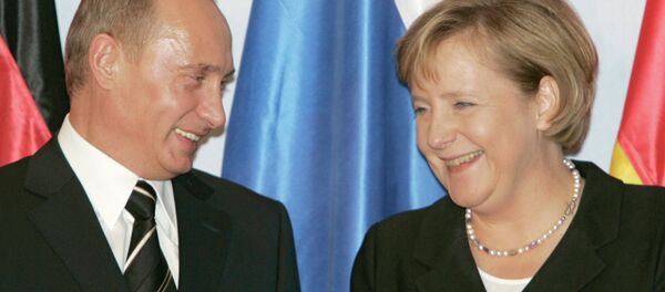 Rusya Devlet Başkanı Vladimir Putin ve Almanya Başbakanı Angela Merkel - Sputnik Türkiye