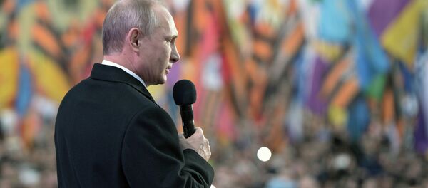 Vladimir Putin, Kırım'ın Rusya'ya katılışının yıldönümü kutlamalarında - Sputnik Türkiye