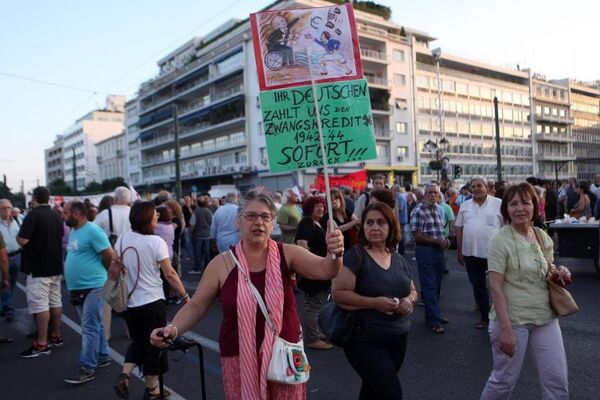 Atina'da, Aleksis Çipras başbakanlığındaki hükümete destek gösterisi düzenlendi. Atina'da, Aleksis Çipras başbakanlığındaki hükümete destek gösterisi düzenlendi. - Sputnik Türkiye