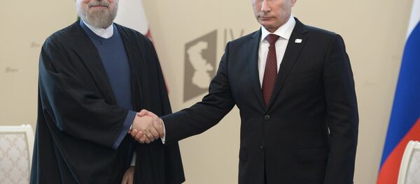 Rusya Devlet Başkanı Vladimir Putin ve İran Cumhurbaşkanı Hasan Ruhani - Sputnik Türkiye