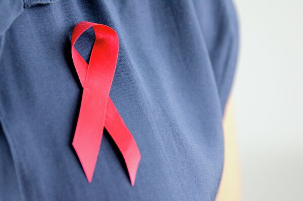 Imperial College London'dan Dr. Rajesh Gurrala, diğer bulaşıcı hastalık uzmanlarıyla iş birliği yaparak CMOS çipli virüs yükü izleyici bir cihaz geliştirdi. - Sputnik Türkiye