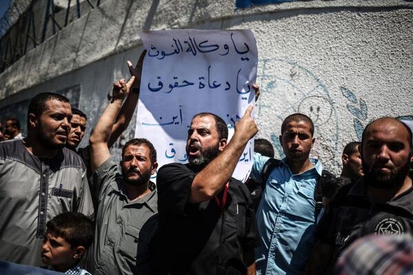 Hamas öncülüğündeki gösteri, UNRWA'nın Gazze'deki merkezi önünde gerçekleştirildi. - Sputnik Türkiye