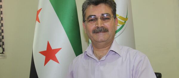 Suriye geçici hükümetinin Sağlık Bakanı Muhammed Vecih Cuma - Sputnik Türkiye