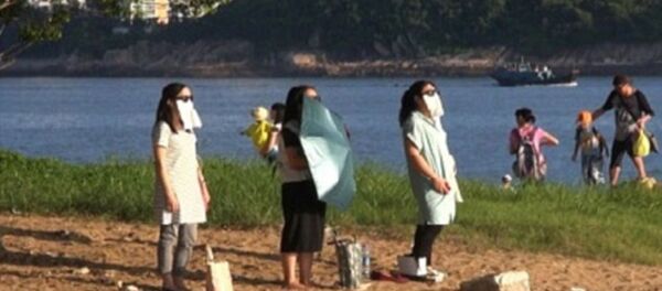 Hong Kong güneş banyosu Hong Kong güneş banyosu - Sputnik Türkiye