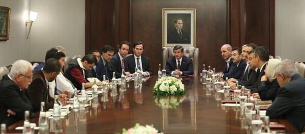 Ahmet Davutoğlu, sığınmacı temsilcileri Ahmet Davutoğlu, sığınmacı temsilcileri - Sputnik Türkiye