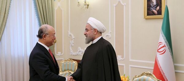 Uluslararası Atom Enerjisi Kurumu (IAEA) Başkanı Yukiya Amano- İran Cumhurbaşkanı Hasan Ruhani - Sputnik Türkiye