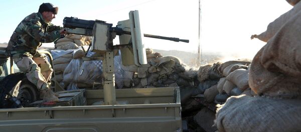 Sincar’da Peşmergenin IŞİD militanlarıyla çatışma anı. - Sputnik Türkiye