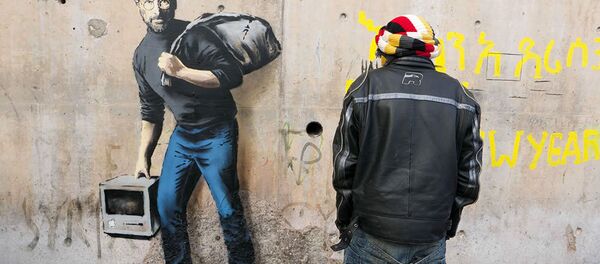 Banksy, 'Suriyeli göçmen' Steve Jobs'u çizdi Banksy, 'Suriyeli göçmen' Steve Jobs'u çizdi - Sputnik Türkiye
