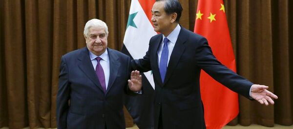 Suriye Dışişleri Bakanı Velid Muallim- Çin Dışişleri Bakanı Wang Yi - Sputnik Türkiye
